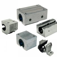 Paliers à billes à douilles ouvertes